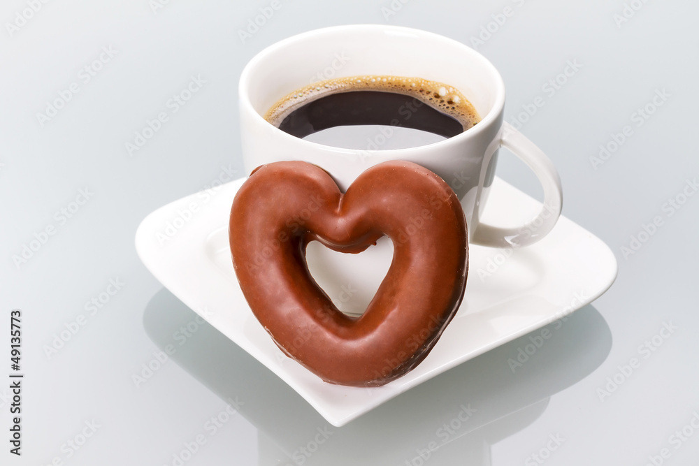 Gingerbread heart with coffee as a love symbol