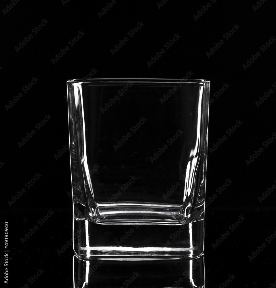 Empty glass, isolated on black background