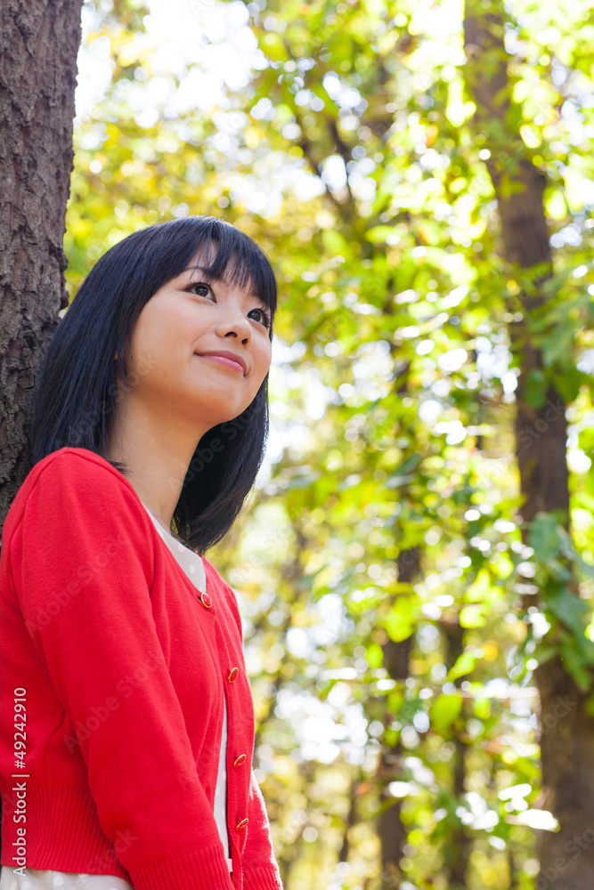 attractive asian woman in the park