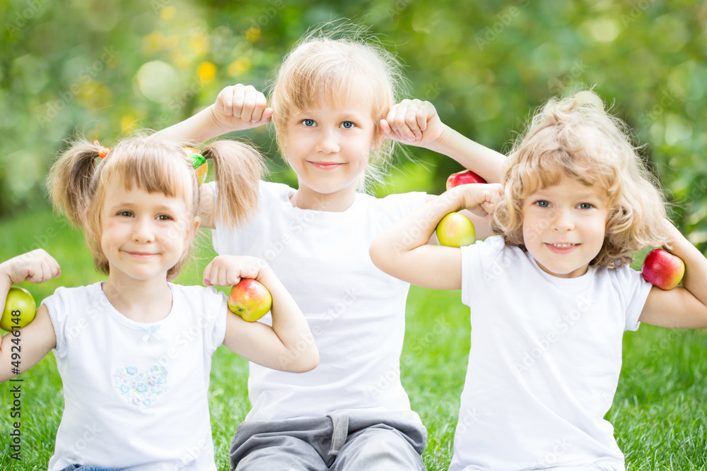 Happy children with apples