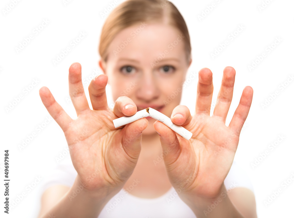 woman breaking cigarette. concept stop smoking