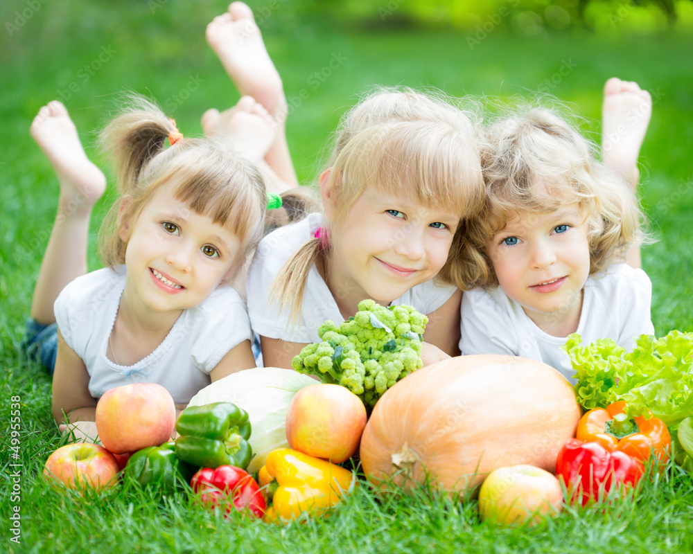 Children having picnic outdoors