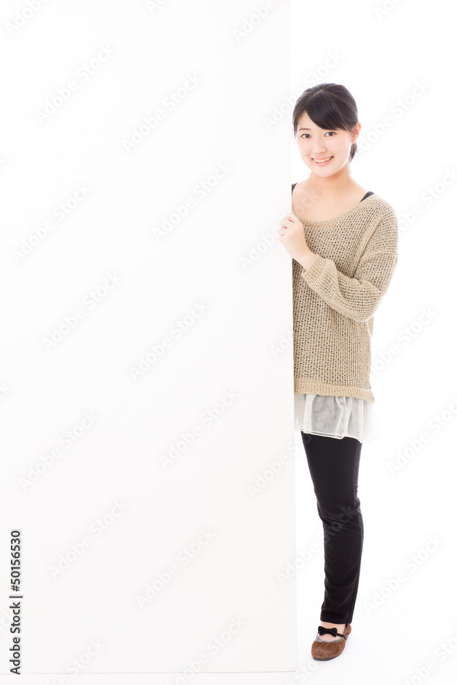 a young asian woman with blank whiteboard