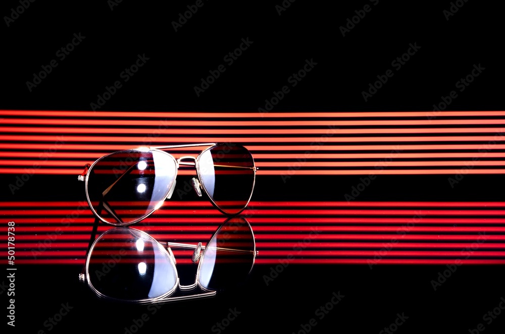 Sunglasses on colorful background, copyspace