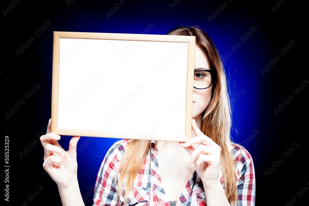 Smiling woman with nerd glasses holding empty frame