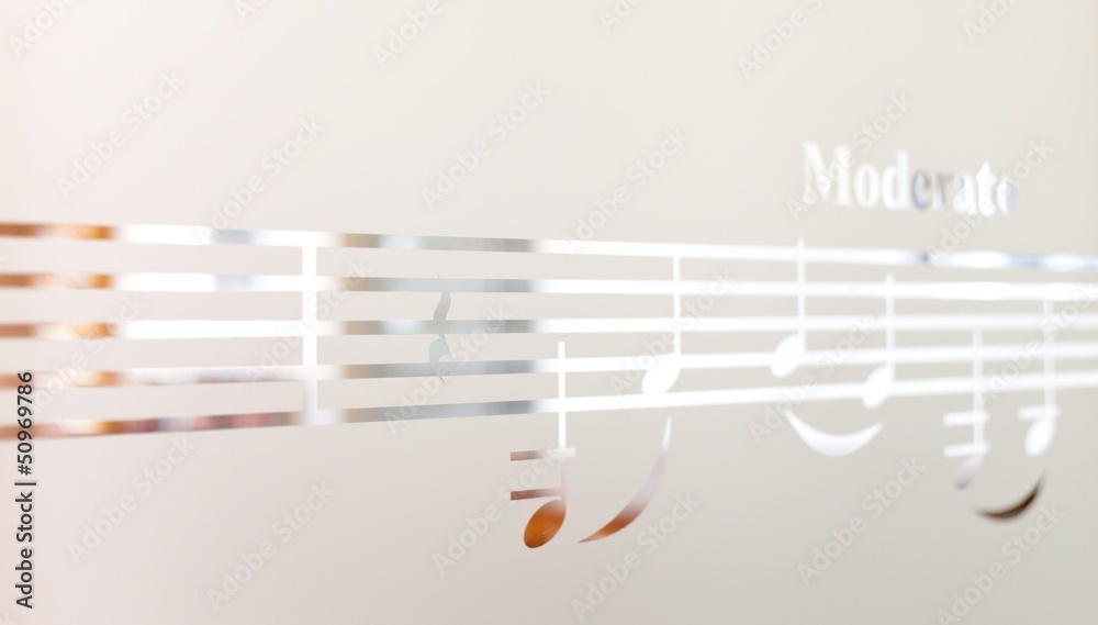 Musical notes on frosted glass, art background