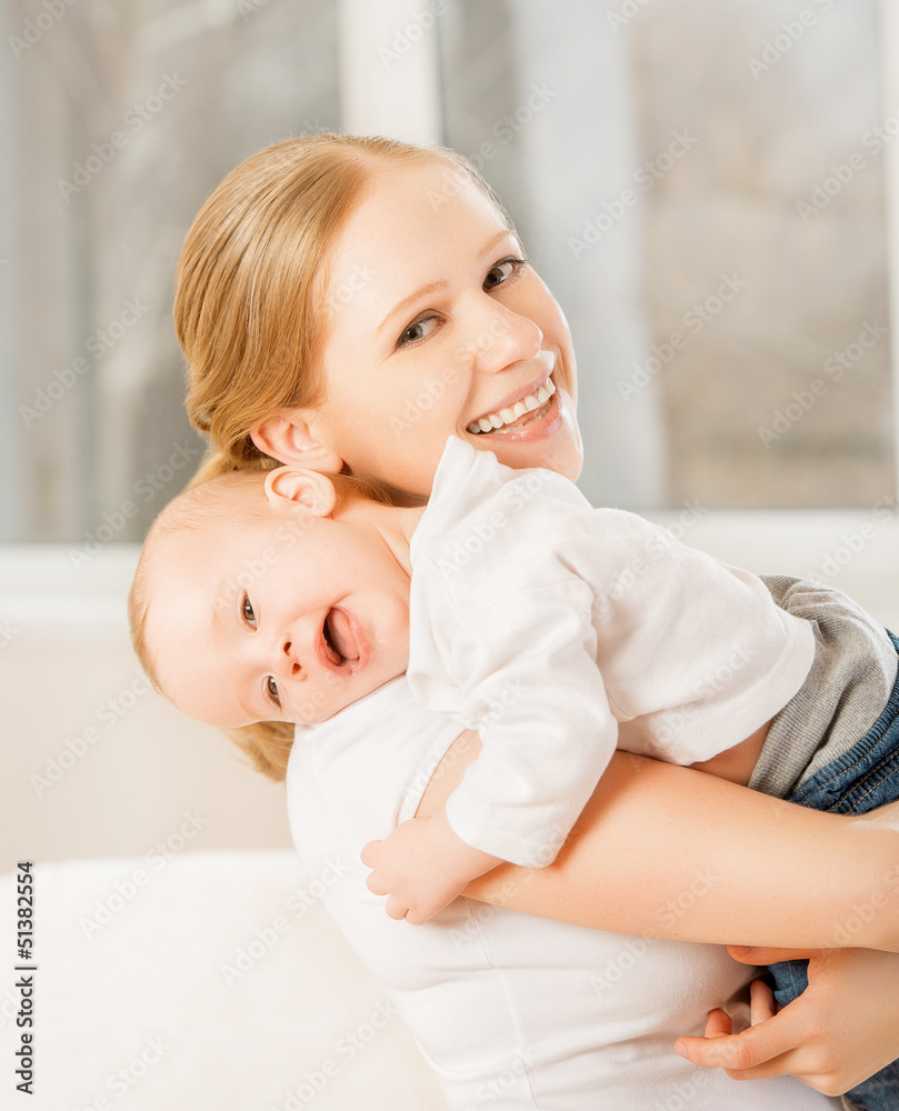 happy family. mother and baby hugging