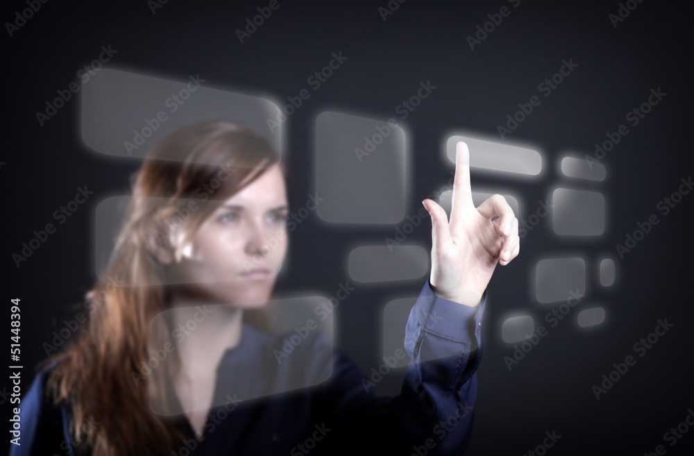 Woman hand pushing the button on touch screen