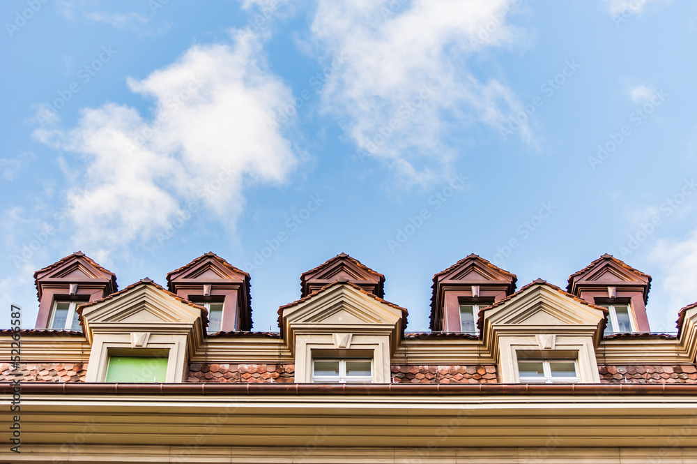 House gables with blue sky