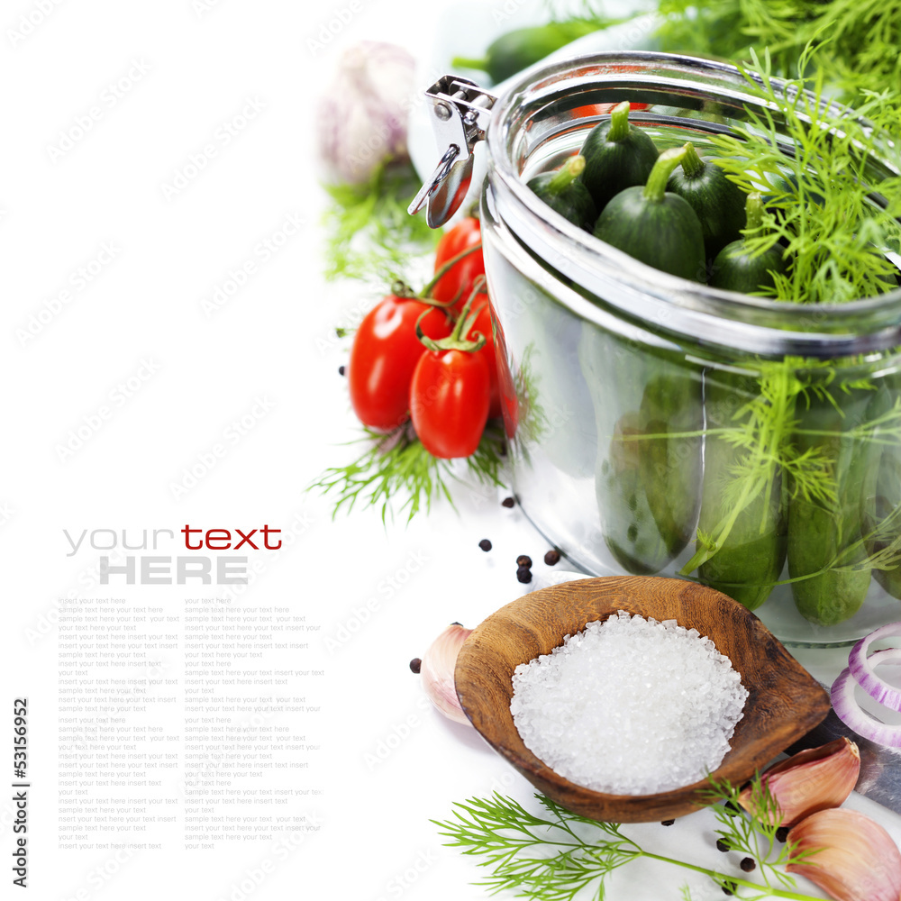 preparing preserves of pickled cucumbers and tomatoes