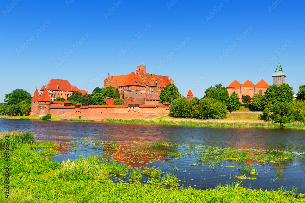 Malbork castle in summer scenery, Poland