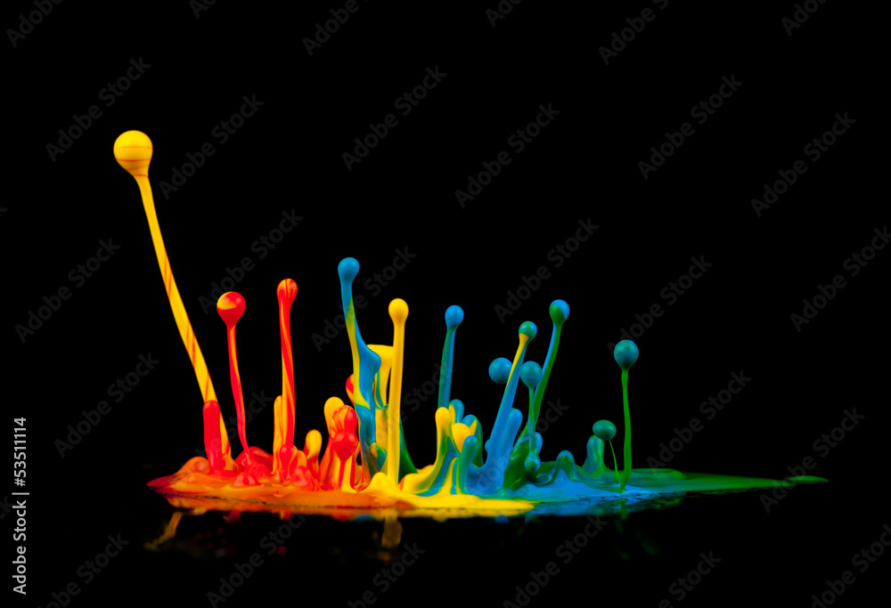 Colored splashes isolated on black background