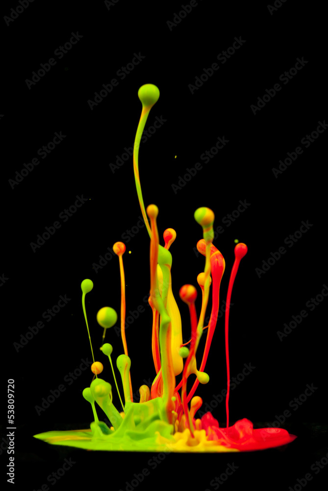 Colored splashes isolated on black background