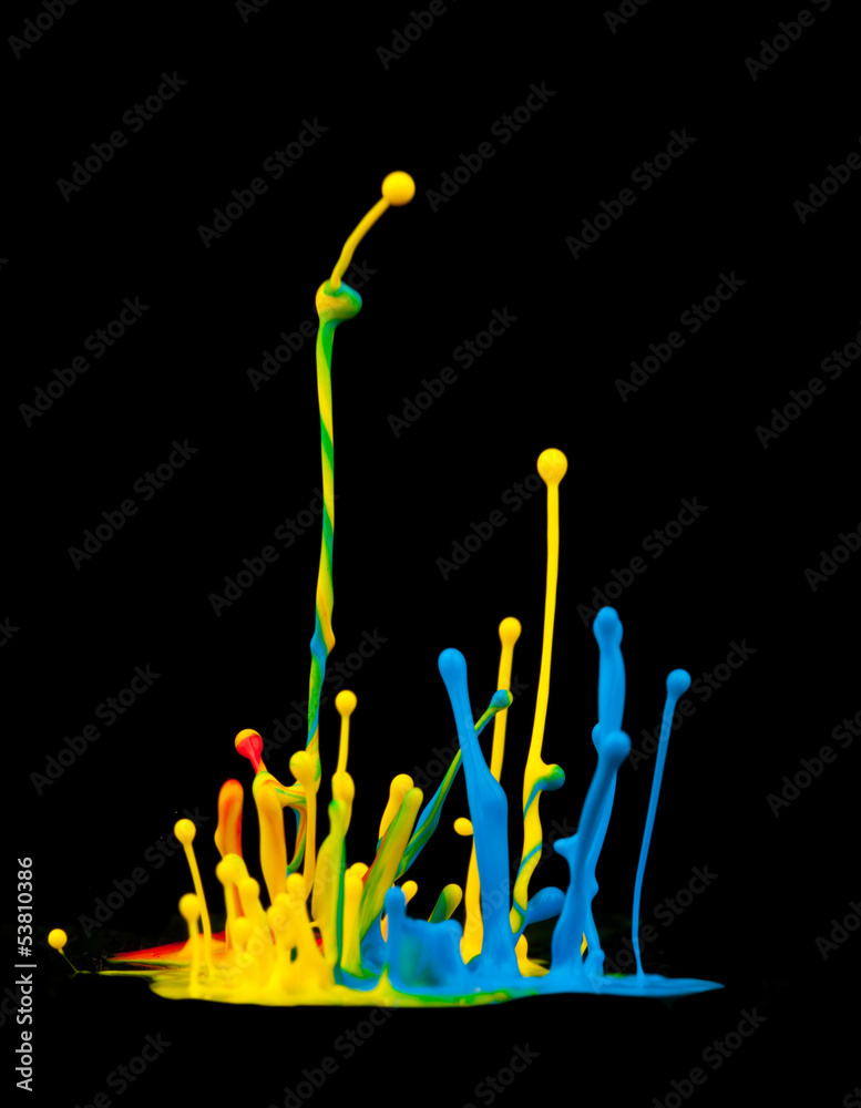 Colored splashes isolated on black background