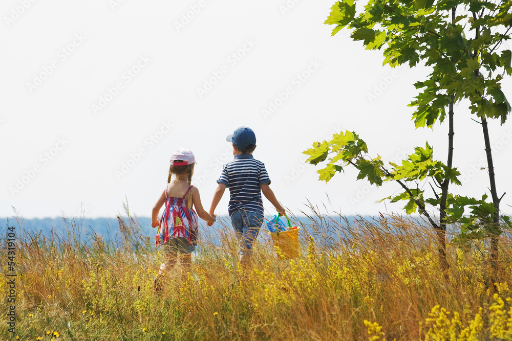 Boy and girl are going to the sea