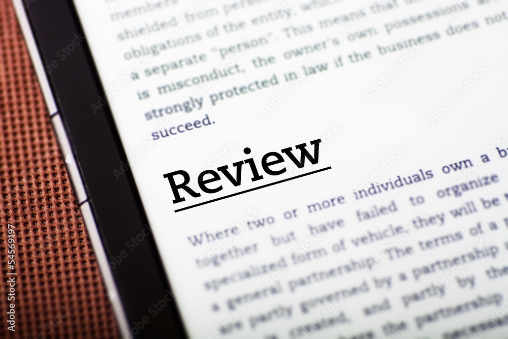 Review on tablet screen, ebook concept