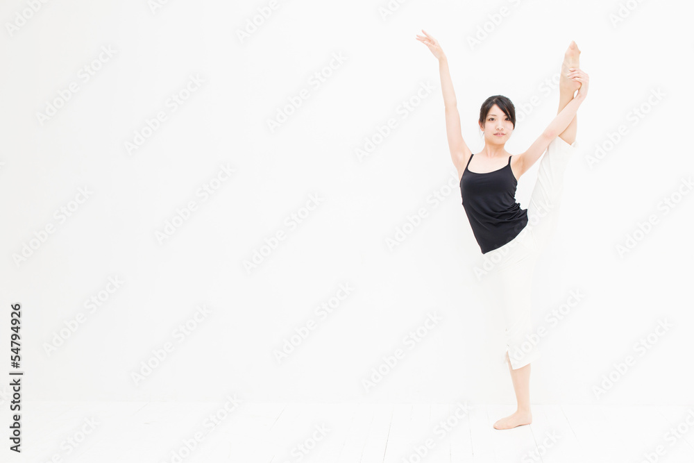 attractive asian woman exercising on white background