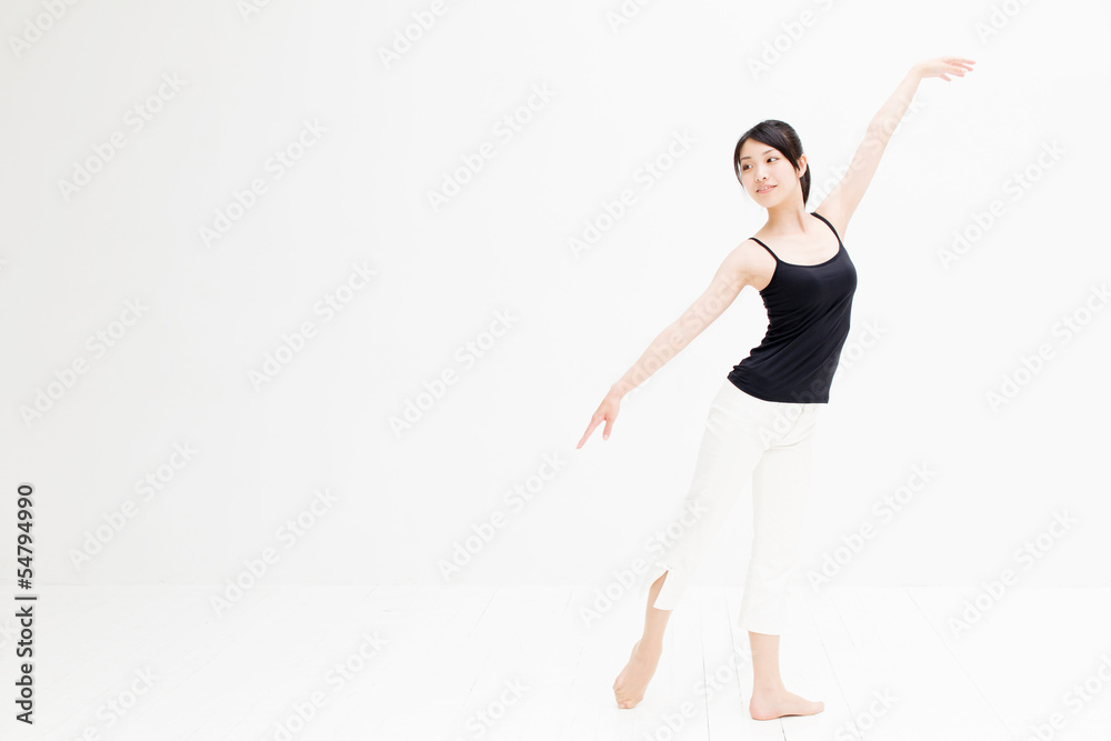 attractive asian woman exercising on white background