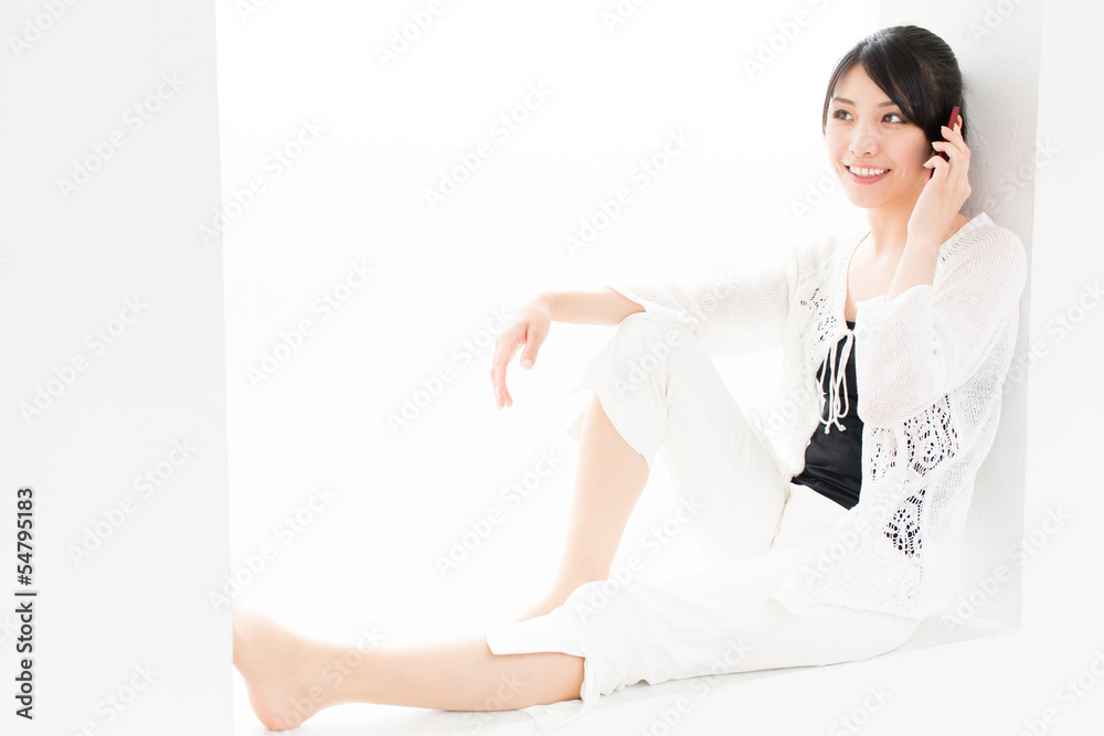 attractive asian woman using smart phone