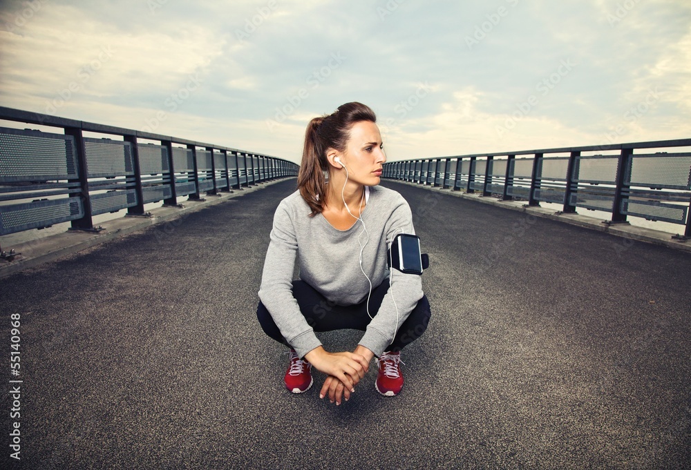 Female Runner Sitting