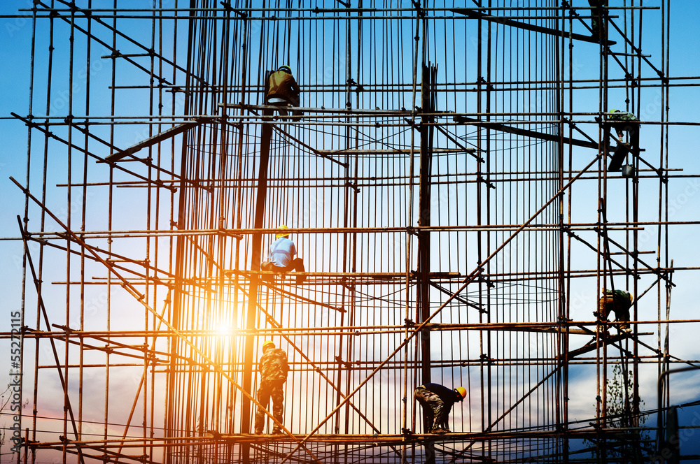 construction workers in the sunset