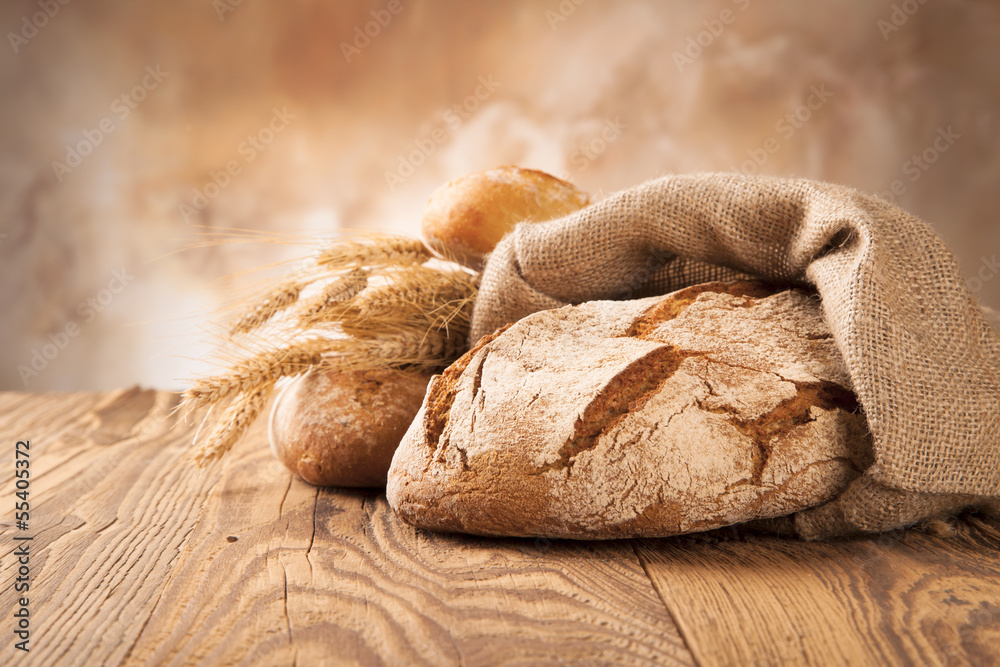 Fresh bread on wood