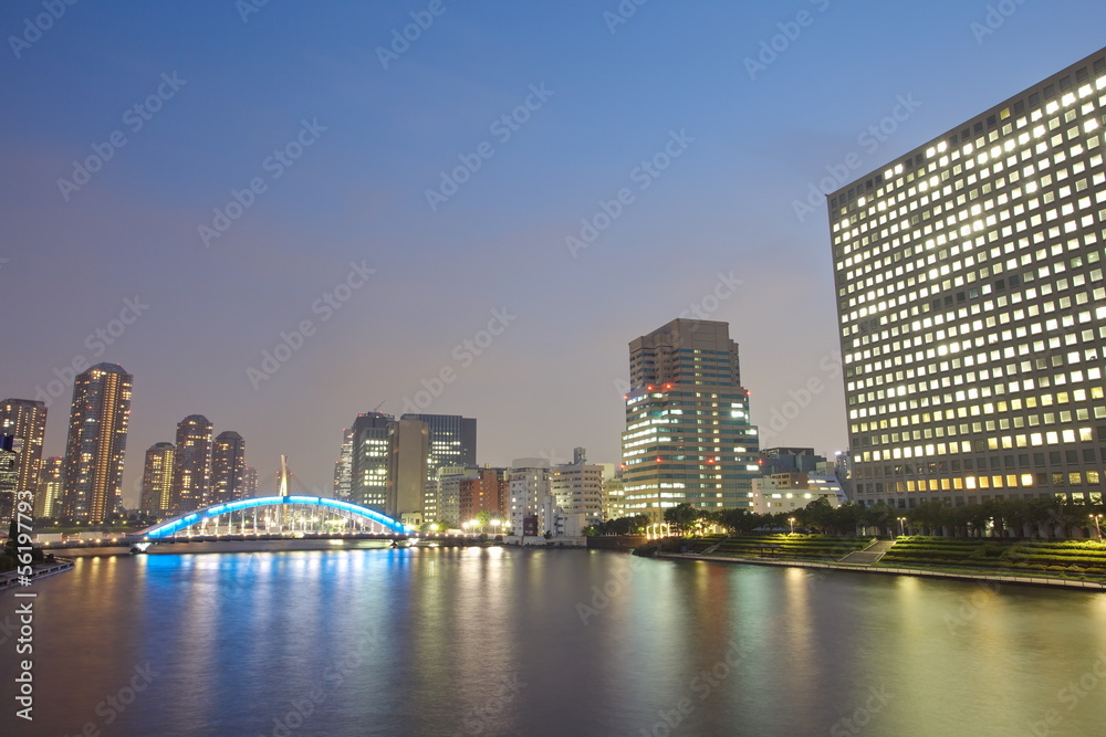 Tokyo skyline by night in modern Tsukishima district