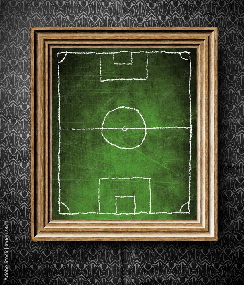 Soccer field symbol chalkboard in old wooden frame