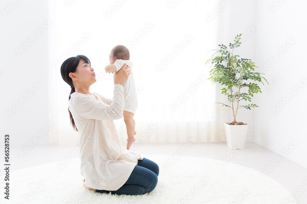 asian baby and mother relaxing