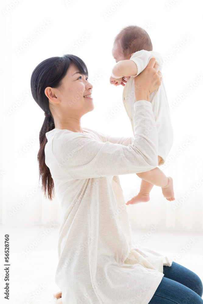 asian baby and mother relaxing