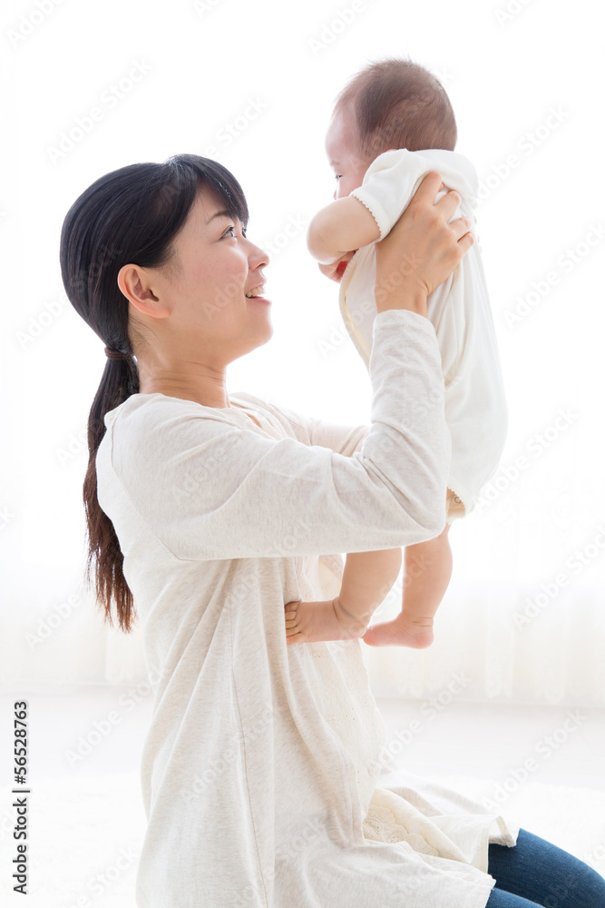 asian baby and mother relaxing