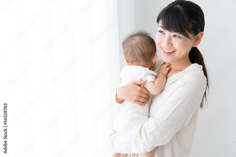 asian baby and mother relaxing