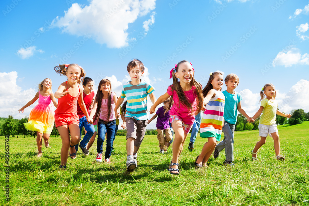 Kids running enjoying summer