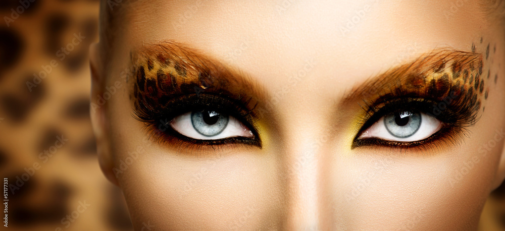 Beauty Fashion Model Girl with Holiday Leopard Makeup