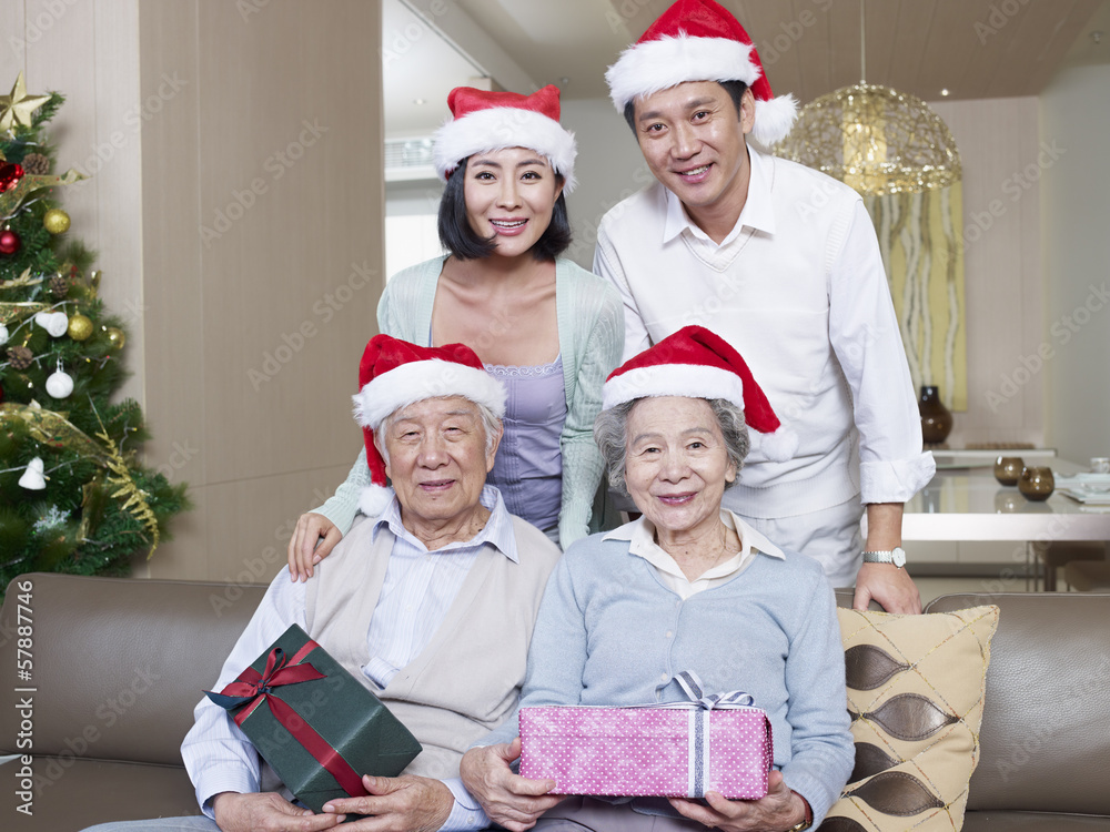 Asian Family with Christmas Hats