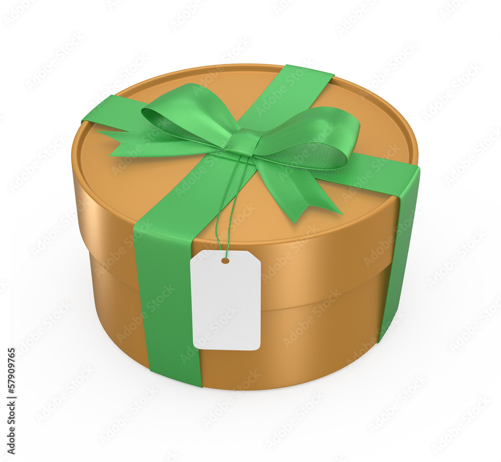 Gold gift box wrapped with green ribbon, blank tag