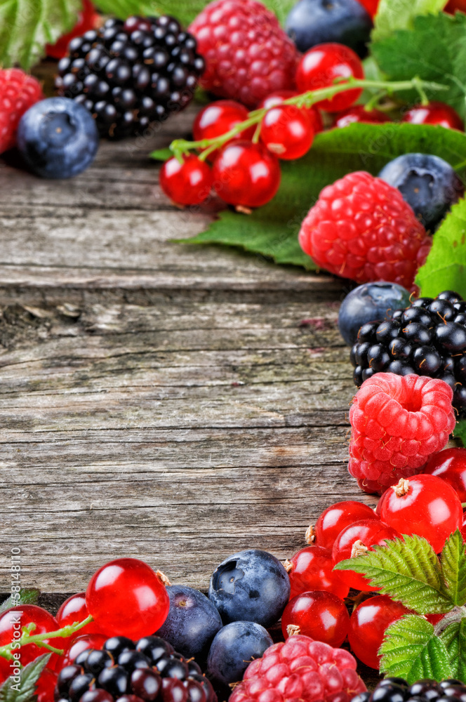 Frame with fresh summer berries