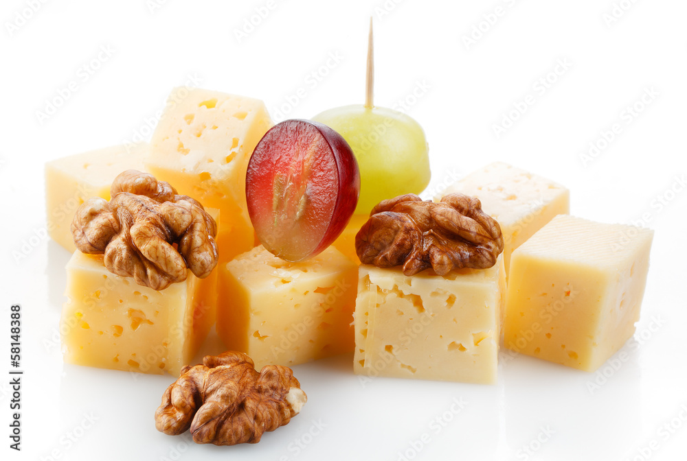 Canape with cheese, grape, olive and nuts. Macro