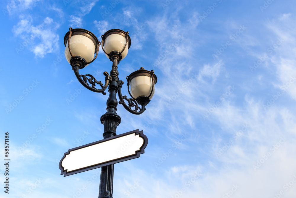 street lamp and board