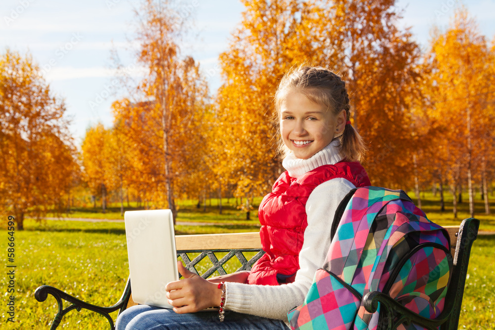 School girl with laptop