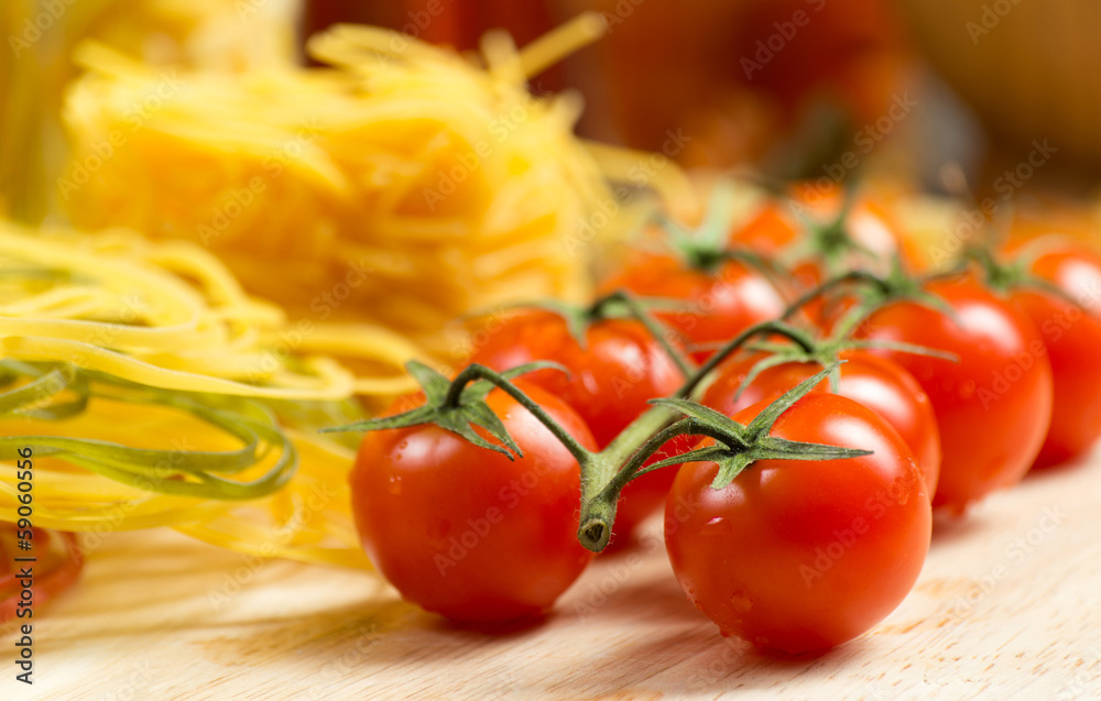 close-up of cherry tomatoes and pasta