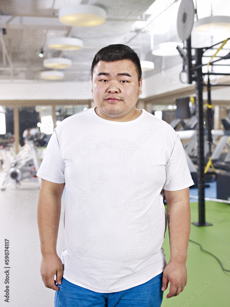 overweight man  in gym