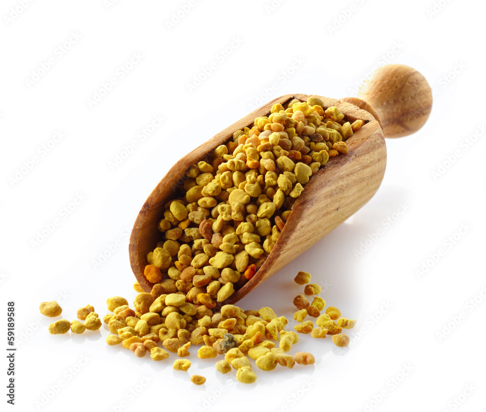 bee pollen in a wooden scoop