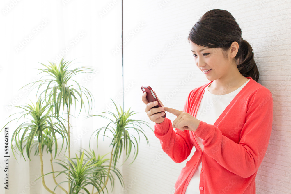 young asian woman using smart phone