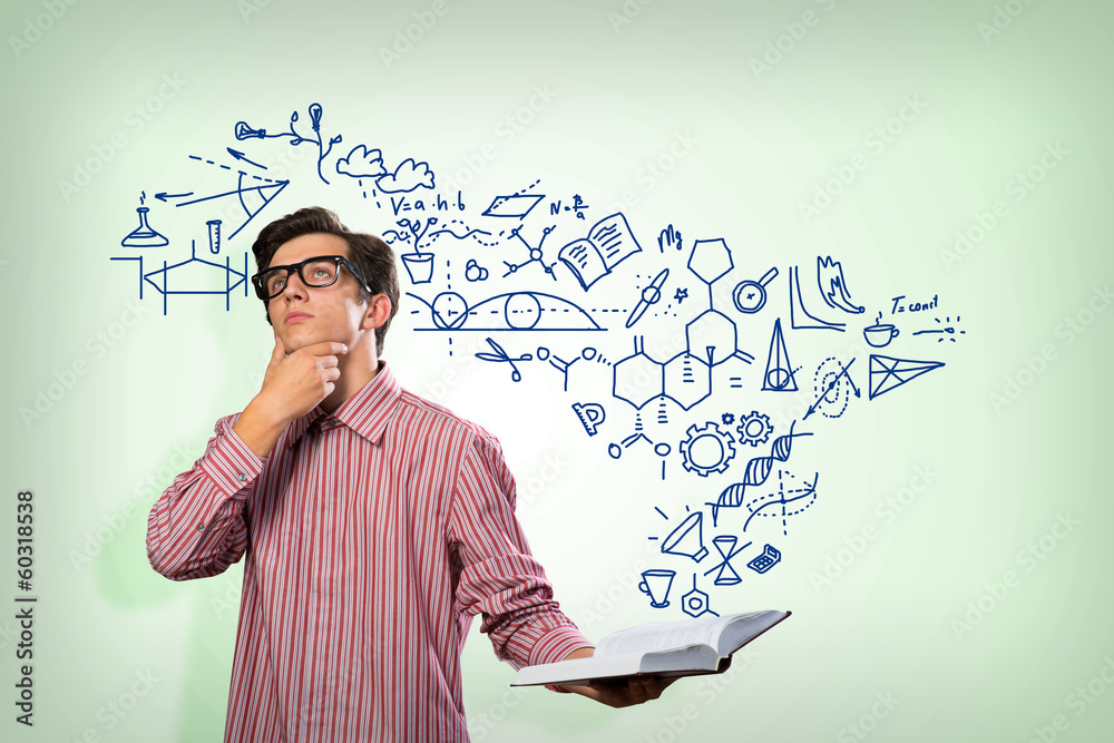 young scientist holding a book