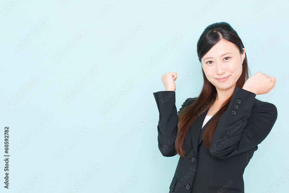 young asian businesswoman cheering