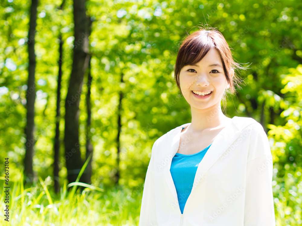 young asian sporty woman in the park