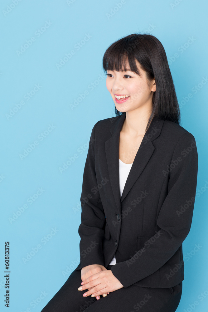 asian businesswoman interviewing on blue background