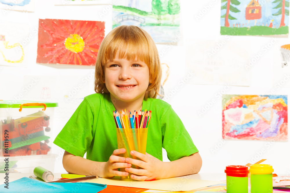 Boy with pencils