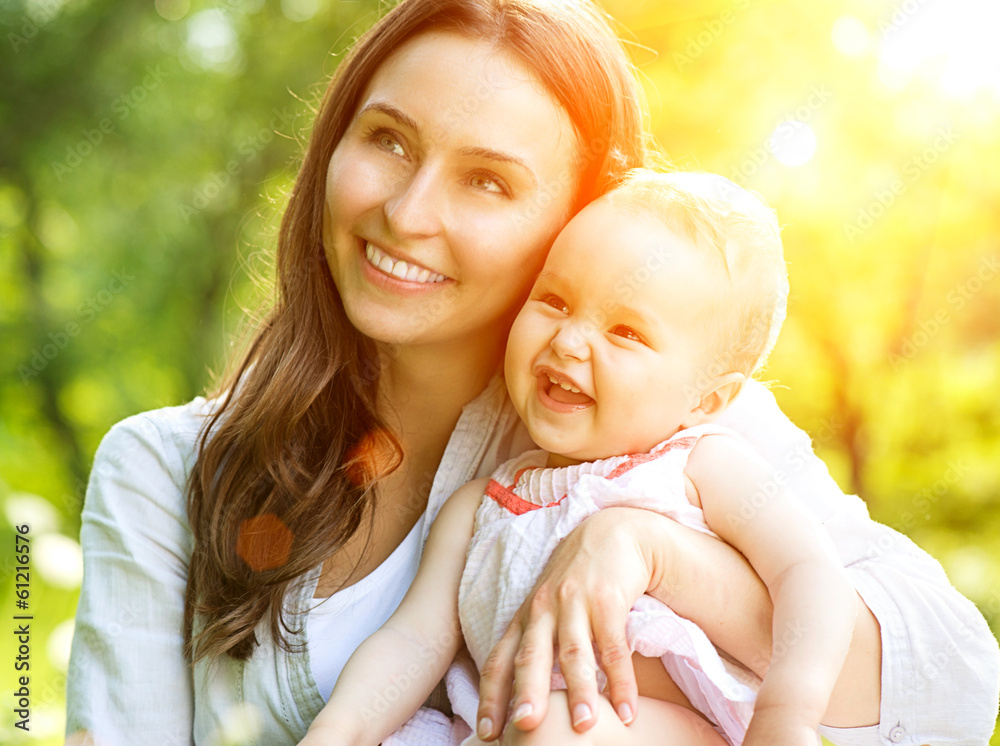 Beautiful Mother And Baby Outdoors. Nature